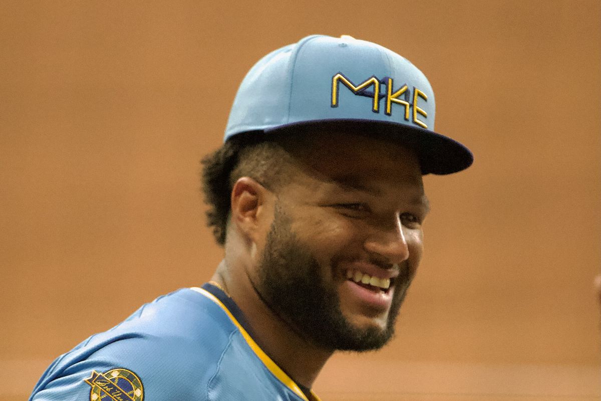 Jackson Chourio of the Milwaukee Brewers swinging at a pitch during a game.
