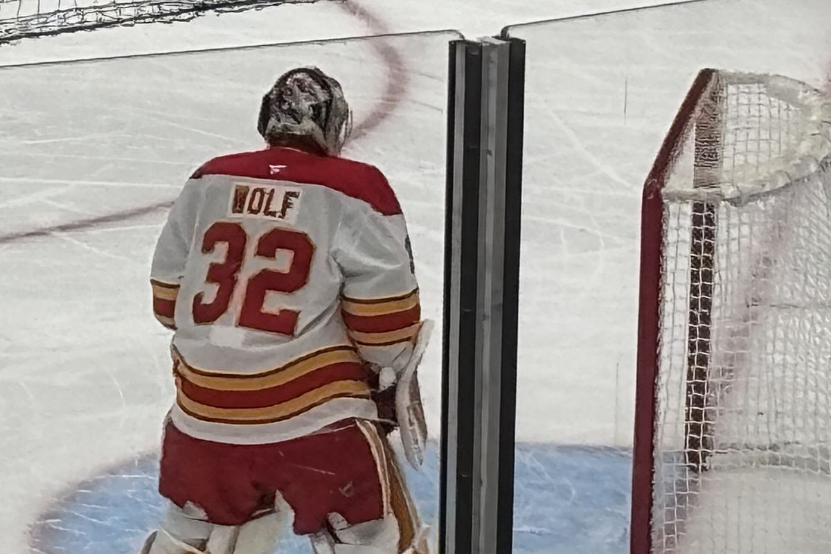 Dustin Wolf in his Calgary Flames goalie gear during a game.